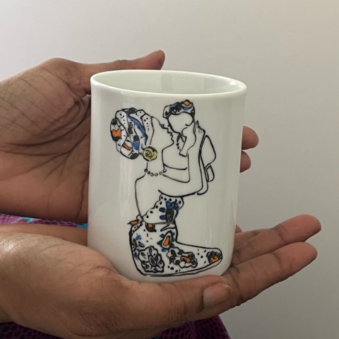 Hand-drawn and hand-painted Yaye porcelain Limoges mug.
